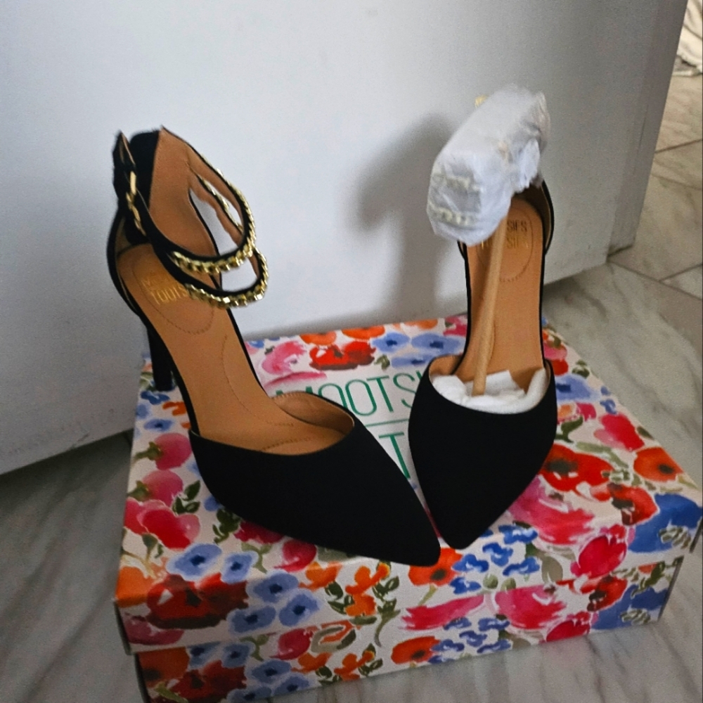 Sexy black with gold ankle chains. Zippered back for easy slip on.  Brand new.